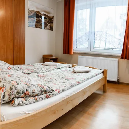 Chałubińskiego 22c *